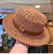 Vintage hollow woven boater straw hat with leather belt in caramel
