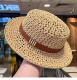 Vintage hollow woven boater straw hat with leather belt in khaki